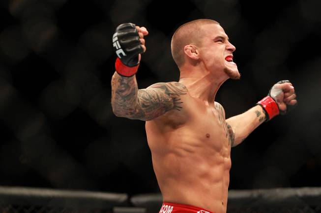 Dustin Poirier celebrates his victory over Diego Brandao at UFC 168 Saturday, Dec. 28, 2013 at the MGM Grand Garden Arena.