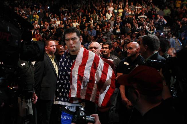 Chris Weidman makes his entrance for his middleweight title defense against Anderson Silva at UFC 168 Saturday, Dec. 28, 2013 at the MGM Grand Garden Arena. Weidman won by TKO after he checked a Silva kick which broke Silva's leg.