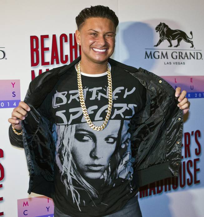 DJ Pauly D shows of his new Britney shirt on the Red Carpet at Beachers Madhouse MGM Grand Hotel & Casino on Friday, Dec. 27, 2013.