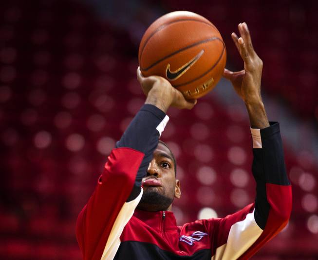 UNLV's Roscoe Smith warms up before the start of the game versus Cal-State Fullerton on Saturday, Dec. 28, 2013. 