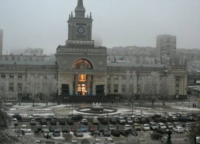 In this photo made by a public camera and made available by the Associated Press Television News, the flash of an explosion illuminates the entrance to Volgograd railway station in Volgograd, Russia, on Sunday, Dec. 29, 2013.