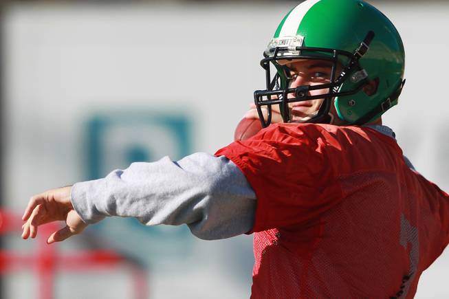Quarterback Derek Thompson throws during the North Texas practice for the Heart of Dallas Bowl Monday, Dec. 30, 2013 at Highland Park High School in Dallas.