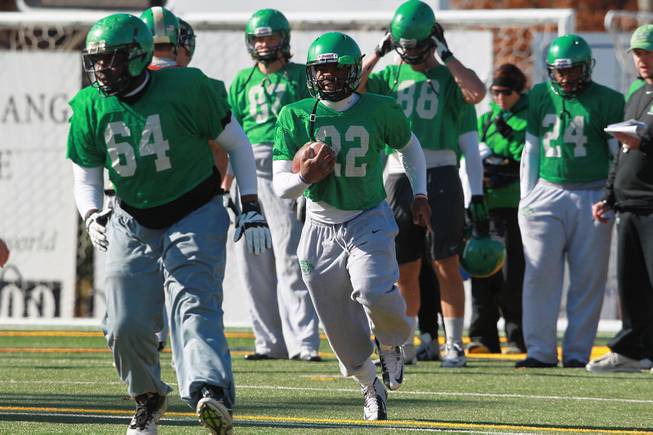 Running back Antoinne Jimmerson carries the ball during the North Texas practice for the Heart of Dallas Bowl Monday, Dec. 30, 2013 at Highland Park High School in Dallas.