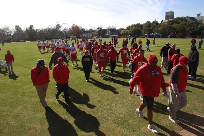 The UNLV football team heads for their busses after practice on the campus of Southern Methodist University for the Heart of Dallas Bowl Monday, Dec. 30, 2013 in Dallas.