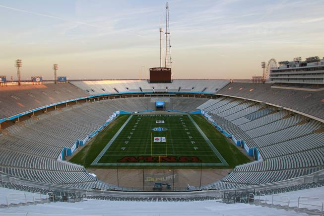 The field of the Cotton Bowl in Dallas is painted Monday, Dec. 30, 2013, for UNLV to take on North Texas in Heart of Dallas Bowl on New Year's Day.
