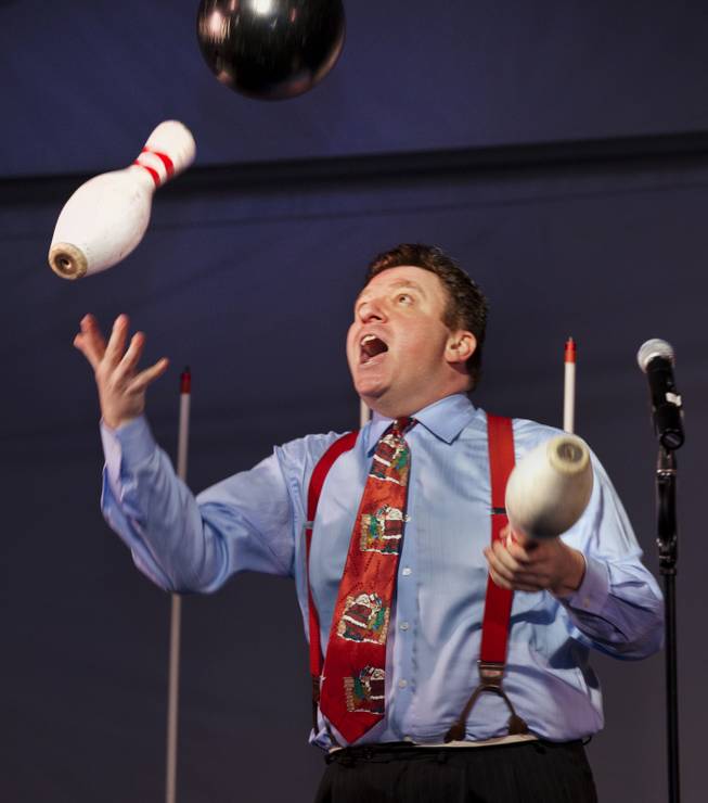 Juggler and comedian Andy Martello juggles a real bowling ball and pins during a family variety show in the Magical Forest at Opportunity Village on Monday , Dec. 30, 2013. L.E. Baskow