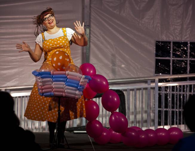 Renowned balloon artist Tawney Bubbles begins her unique act for a family variety show in the Magical Forest at Opportunity Village on Monday , Dec. 30, 2013. L.E. Baskow