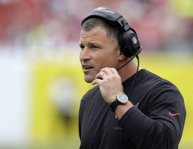 In a Sunday, Dec. 15, 2013, file photo, Tampa Bay Buccaneers coach Greg Schiano watches during the first quarter of an NFL football game against the San Francisco 49ers, in Tampa, Fla. 