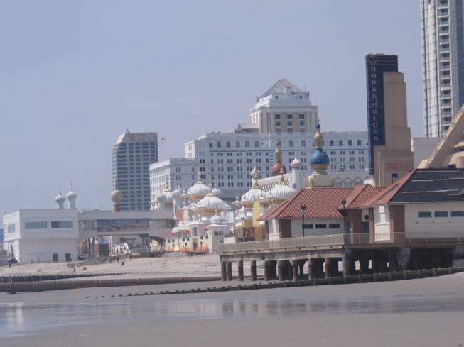 This April 8, 2013, photo shows the Atlantic City N.J., beachfront at low tide. New Jersey Gov. Chris Christie says 2014 is a crucial year for Atlantic City to show progress in recovering from its challenges, or else the governor will begin considering whether to allow casinos to expand to other areas of the state.