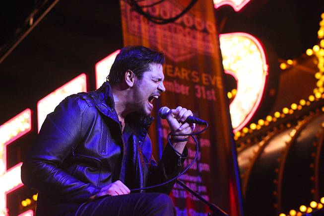 Adelitas Way performs during New Year's Eve festivities at Fremont Street Experience on Tuesday, Dec. 31, 2013,  in downtown Las Vegas. An estimated 335,000 tourists were expected to visit Las Vegas to celebrate the New Year.