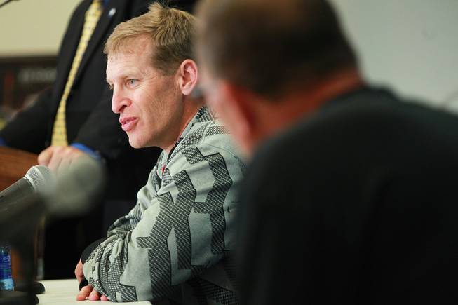 UNLV head coach Bobby Hauck answers a question during a news conference for the Heart of Dallas Bowl Tuesday, Dec. 31, 2013 at the Cotton Bowl in Dallas.