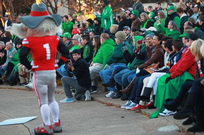 North Texas fans look and take photos of Hey Reb during a pep rally for the Heart of Dallas Bowl Tuesday, Dec. 31, 2013 at the state fairgrounds near the Cotton Bowl in Dallas.
