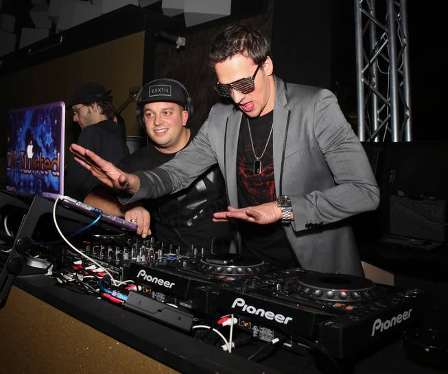 Ryan Lochte, right, with DJ Twisted, hosts at SHe by ...