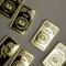 Photo: Ten-gram gold bars lie are shown on display in Dub