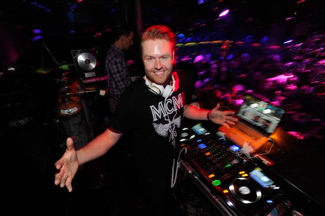 DJ Ikon leads the party at the Bank on Tuesday, ...