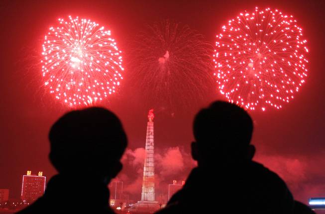 Fireworks explode over Juche Tower and the Taedong River in Pyongyang, North Korea to celebrate the New Year on Wednesday, Jan 1, 2014.
