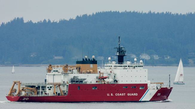 This Aug. 6, 2007 file photo shows the U.S. Coast Guard icebreaker Healy leaving Seattle for a scientific mission in the Arctic that will include breaking ice well north of Barrow, Alaska. The U.S. is racing to keep pace with stepped-up activity in the once sleepy Arctic frontier, but it is far from being in the lead.