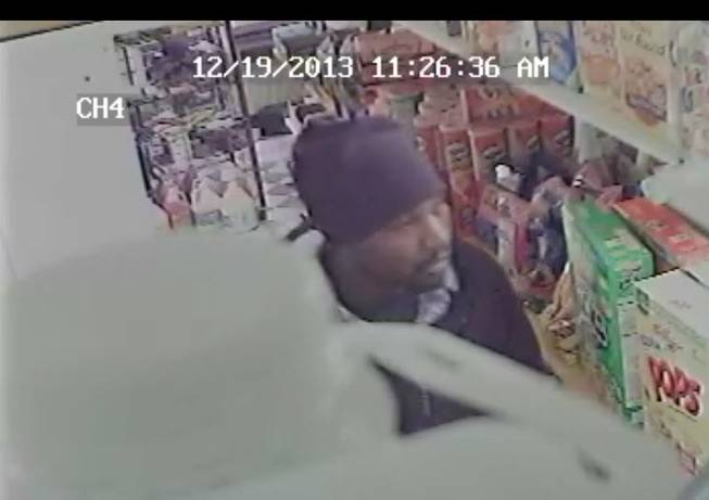 North Las Vegas police are asking the public for help finding and identifying a man who robbed a clerk at gunpoint in mid-December.