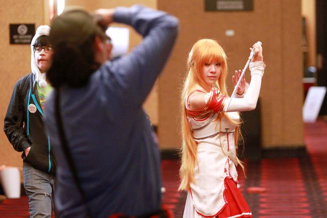Vanessa Degalicia, dressed as character Asuna from "Sword Art Online," at Otakon Vegas on Saturday, Jan. 4, 2014, at Planet Hollywood.