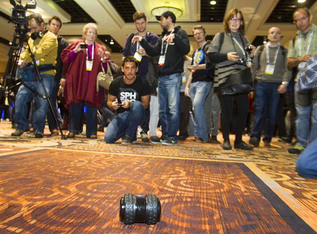 A Sphero 2B by Orbotix is demonstrated during "CES Unveiled," a media preview event to the annual Consumer Electronics Show (CES), in Las Vegas, Jan. 5, 2014. The toy, estimated to retail for about $100, is controlled with a smartphone and is expected to ship in the fall of 2014, a representative said.