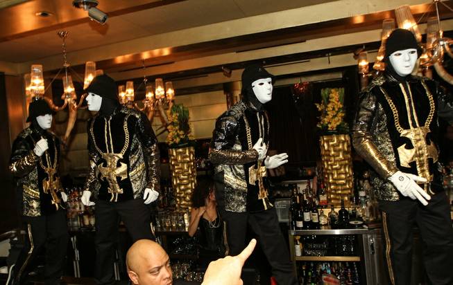 The Jabbawockeez perform at Gold Lounge on Tuesday, Dec. 31, 2013, in Aria.