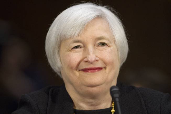 In this Nov. 14, 2013, photo, Janet Yellen of California smiles as she is introduced as the first female nominated as Federal Reserve Board chair before testifying on Capitol Hill in Washington. Yellen was approved by the Senate on Monday, Jan. 6, 2014, to head the Federal Reserve.