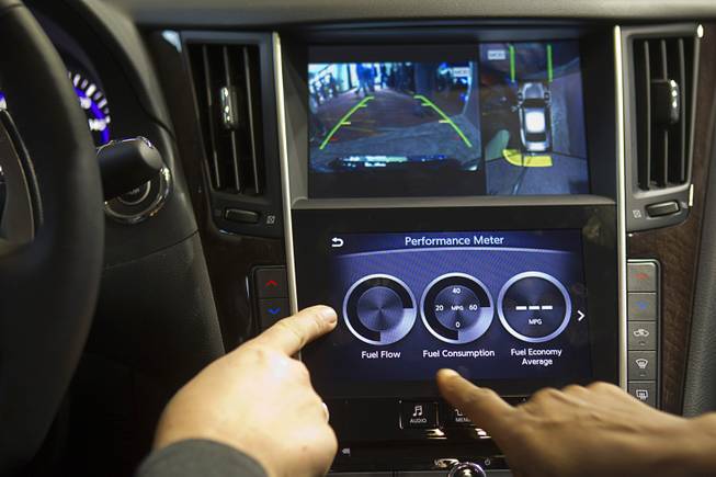 An Infiniti InTouch infotainment system is demonstrated inside an Infinity Q50S during the 2014 International Consumer Electronics Show (CES) in Las Vegas, Tuesday Jan. 7, 2014.