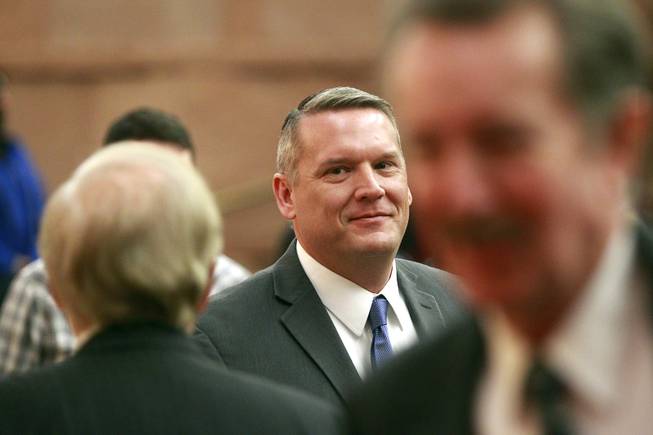 John Entsminger leaves the County Commission chambers after being named the new general manager for the Las Vegas Valley Water District Tuesday, Jan. 7, 2014.