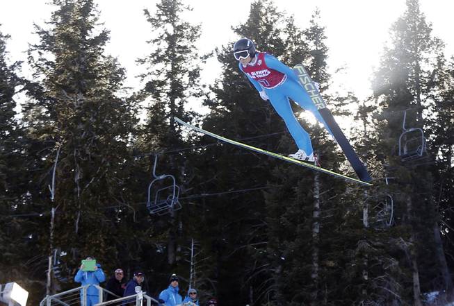 First-place finisher Jessica Jerome competes in the women's ski jumping event at the U.S. Olympic trials in Park City, Utah, Sunday, Dec. 29, 2013.