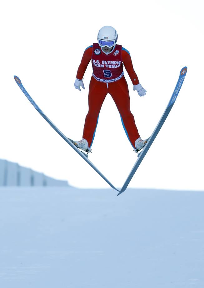 Third-place finisher Alissa Johnson competes in the women's ski jumping event at the U.S. Olympic trials in Park City, Utah, Sunday, Dec. 29, 2013.