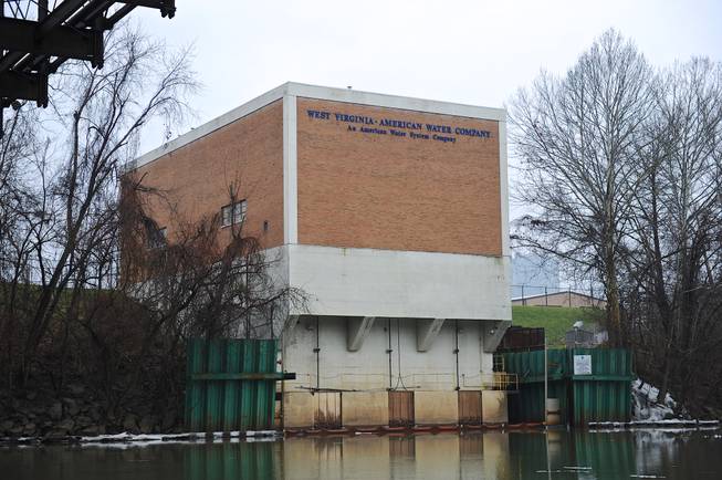 The West Virginia American Water Co. intake facility on the Elk River is closed following a 4-methylcyclohexane methanol leak from a 48,000-gallon tank at Freedom Industries, a chemical storage facility about a mile upriver in Charleston, W.Va., on Friday, Jan. 10, 2014. 