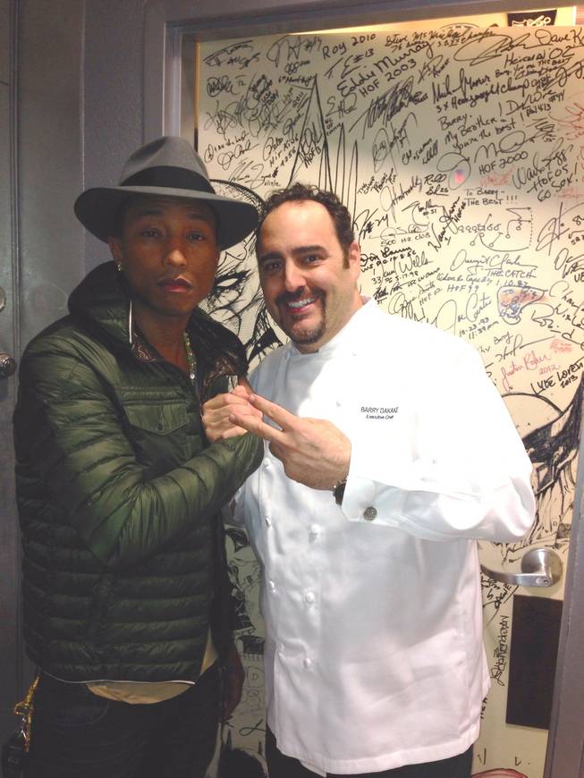 Pharrell Williams and chef Barry Dakake at N9NE Steakhouse on Wednesday, Jan. 8, 2014, in the Palms.