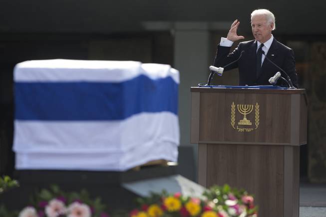 U.S. Vice President Joe Biden delivers a speech next to the coffin of late Israeli Prime Minister Ariel Sharon outside the Knesset, Israel's Parliament, in Jerusalem, Monday, Jan. 13, 2014.