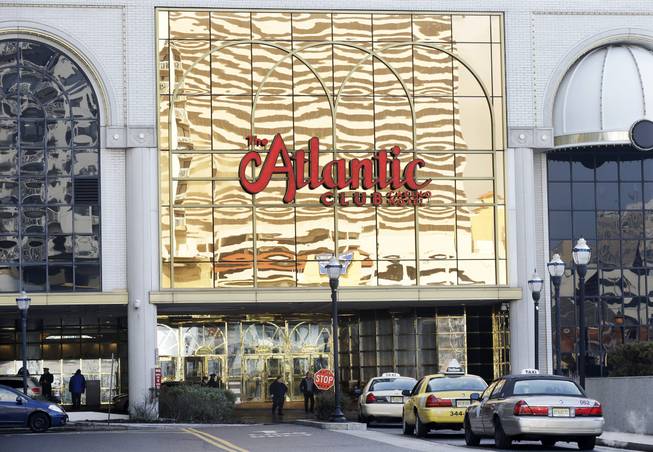 In this Feb. 14, 2013, file photo, the Atlantic Club Casino Hotel is seen in Atlantic City, N.J. On Jan. 12, 2014, customers and employees spent a final few hours at the casino, which closed after midnight.