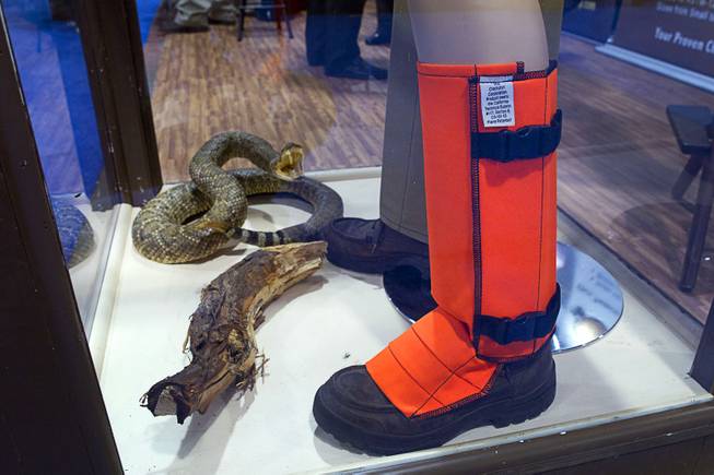 Snake Gardz are displayed at the Crackshot booth during the 2014 SHOT Show (Shooting, Hunting, Outdoor Trade) at the Sands Expo & Convention Center Tuesday, Jan. 14, 2014. Crackshot president Thomas Hargrove said he came up with the design after being unsatisfied with uncomfortable existing designs. The Snake Guardz feature polycarbonate inserts to protect from snake bites and and convention cooling system to prevent overheating, Hargrove said.