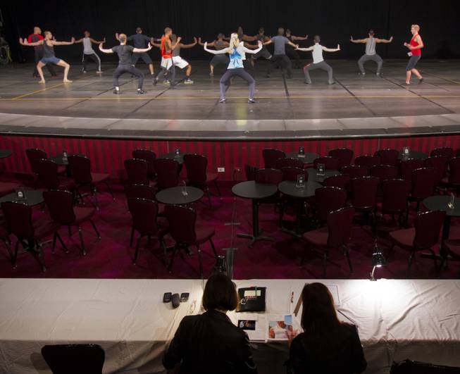 Male dancers run through a choreographed piece during "Jubilee!" auditions on Tuesday, Jan. 14, 2014.