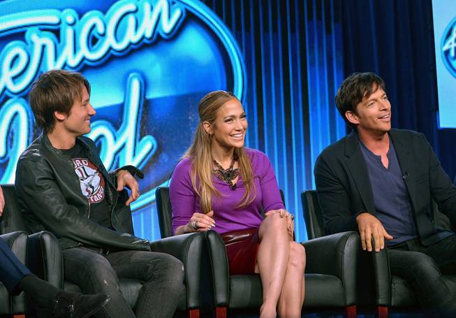 Judges Keith Urban, Jennifer Lopez and Harry Connick Jr. are seen during the panel of "American Idol" at the Fox Winter 2014 TCA on Monday, Jan. 13, 2014, at the Langham Hotel in Pasadena, Calif. 

