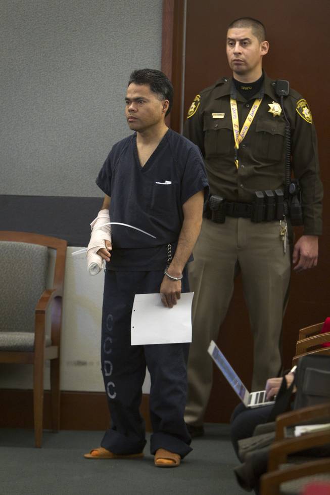 Richard Magdayo Dahan appears in court at the Regional Justice Center Wednesday, Jan. 15, 2014. Dahan is accused of killing his wife Friday then driving to a Metro police station and turning himself in.