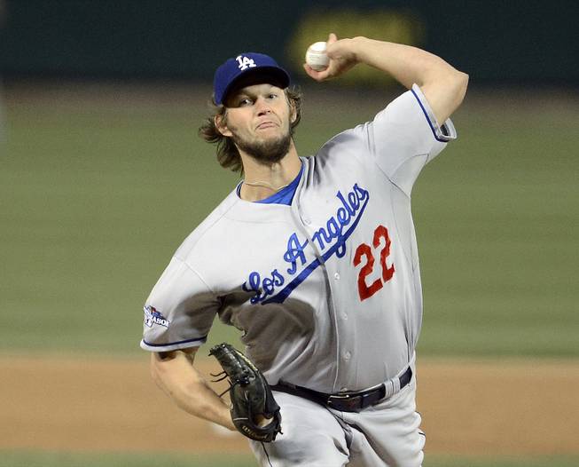 Los Angeles Dodgers starting pitcher Clayton Kershaw throws during the first inning of Game 6 of the National League baseball championship series against the St. Louis Cardinals, Friday, Oct. 18, 2013, in St. Louis. 