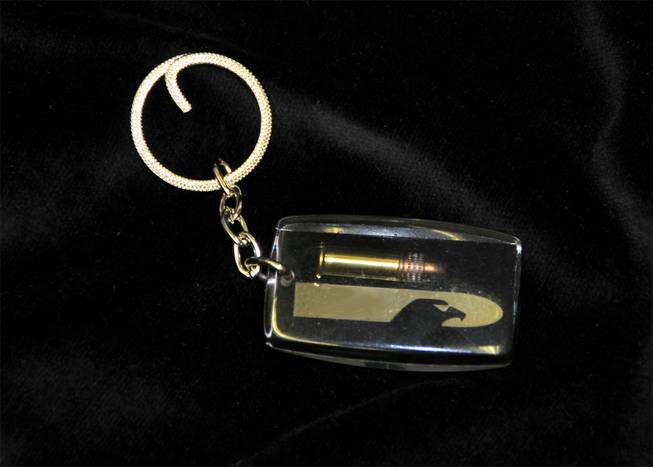 Transportation Security Administration agents confiscated hundreds of keychains with bullets encased in acrylic that were handed out by an exhibitor at the 2012 SHOT Show. 