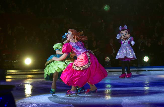 Cinderella's ugly stepsisters collide during "Disney On Ice: Rockin' Ever After" at the Thomas & Mack Center Thursday, Jan. 16, 2014. The show plays at the center through Sunday.