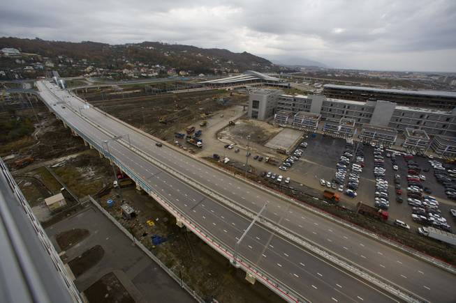 In this photo taken on Wednesday, Nov. 27, 2013,  a new highway is seen on the fringes of the Olympic park in Sochi, Russia.