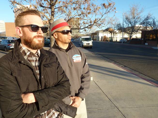 Jesse Herron, left, and Mike Silva, pictured Jan. 16, 2014, run a tour in which customers are taken to sites around Albuquerque where the show "Breaking Bad" was filmed. 