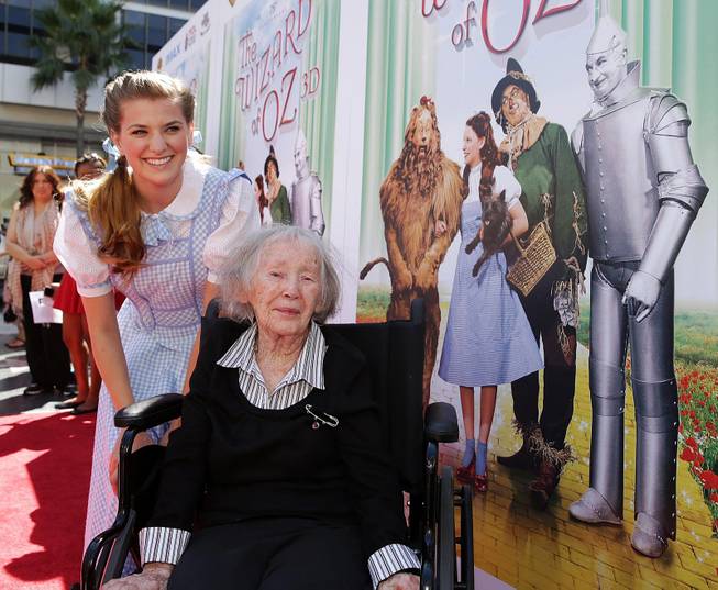 Danielle Wade, left, and Ruth Duccini are shown at the Warner Bros. world premiere screening of "The Wizard of Oz" in IMAX 3D and the grand opening of the newly converted TCL Chinese Theatre IMAX in Los Angeles, Sept. 15, 2013. 