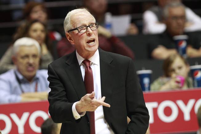 San Diego State head coach Steve Fisher talks to his team during their game against UNLV Saturday, Jan. 18, 2014 at Viejas Arena in San Diego. The 10th ranked SDSU won the game 63-52.