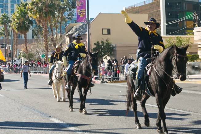 Members of the Buffalo Soldiers of Southern Nevada ride in the 32nd Annual Dr. Martin Luther King Jr. Parade, Monday Jan. 20, 2014.