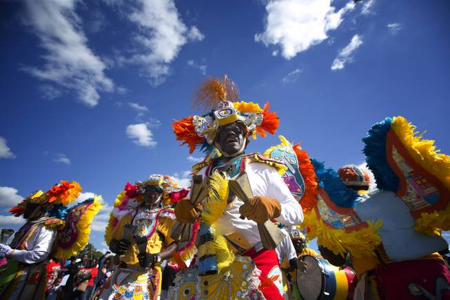 Members of a Caribbean carnival group marches in the MLK parade in Miami, Monday, Jan. 20, 2014. Dr. Martin Luther King, Jr. is honored across the country annually on the third Monday in January with Martin Luther King, Jr. Day. He was the most visible figure in the Civil Rights movement.