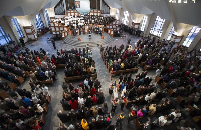 The presentation of the flags of the nations is performed before the start of the Rev. Martin Luther King Jr. holiday commemorative service at Ebenezer Baptist Church Monday, Jan. 20, 2014, in Atlanta. 