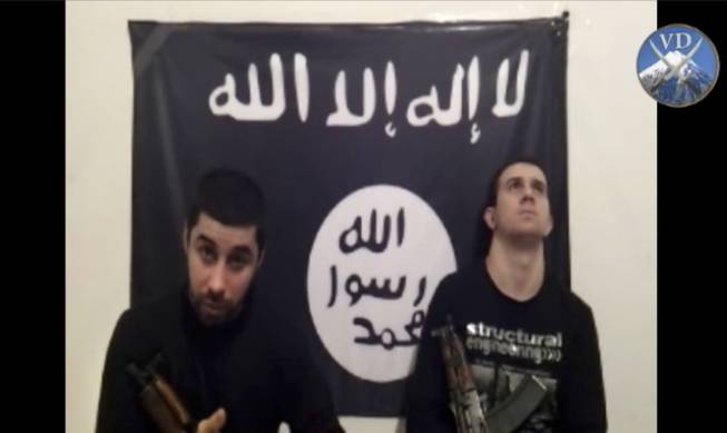 In this image made from a video posted online Sunday, Jan. 19, 2014, by an Islamic militant group asserting responsibility for suicide bombings last month that killed 34 people in Volgograd, Russia, two men, identified as Suleiman and Abdurakhman and who purportedly carried out the twin suicide bombings, are seen at an unknown location.