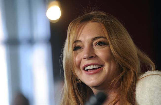 Actress Lindsay Lohan addresses reporters during a news conference at the 2014 Sundance Film Festival on Monday, Jan. 20, 2014, in Park City, Utah. 
